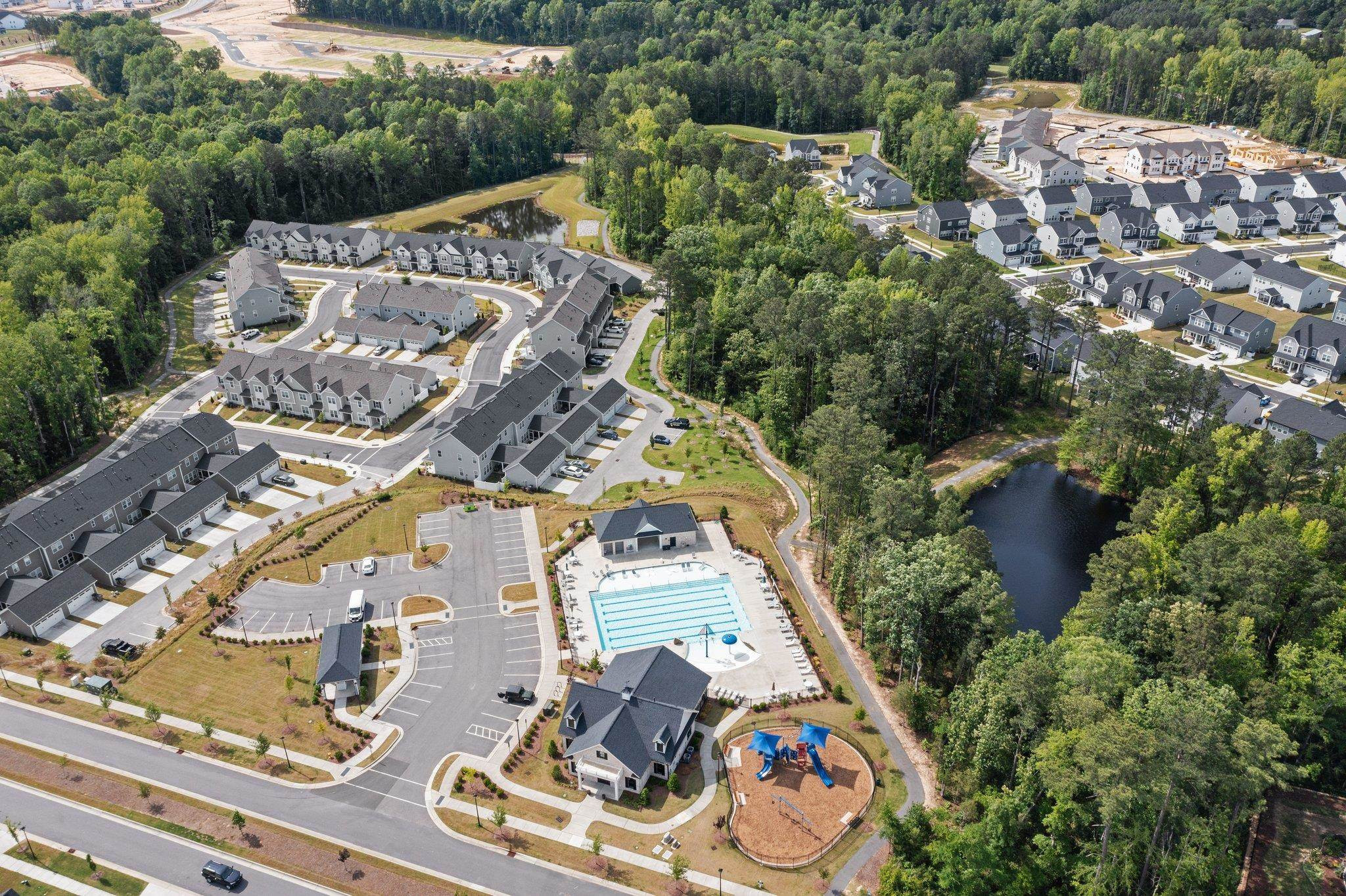 325 Spaight Acrs Way Wake Forest, NC 27587 - Photo 54 of 54 an aerial view of a swimming pool and outdoor space
