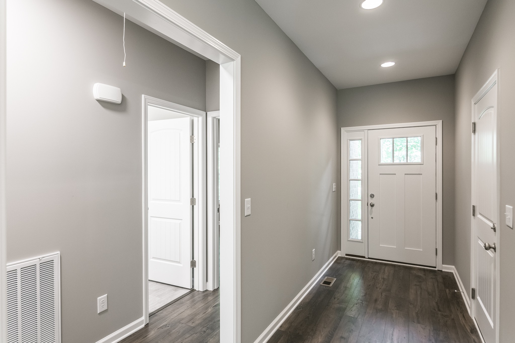 1566 Old Gallatin Road Portland, TN 37148 - Photo 12 of 49 an empty room with wooden floor and windows