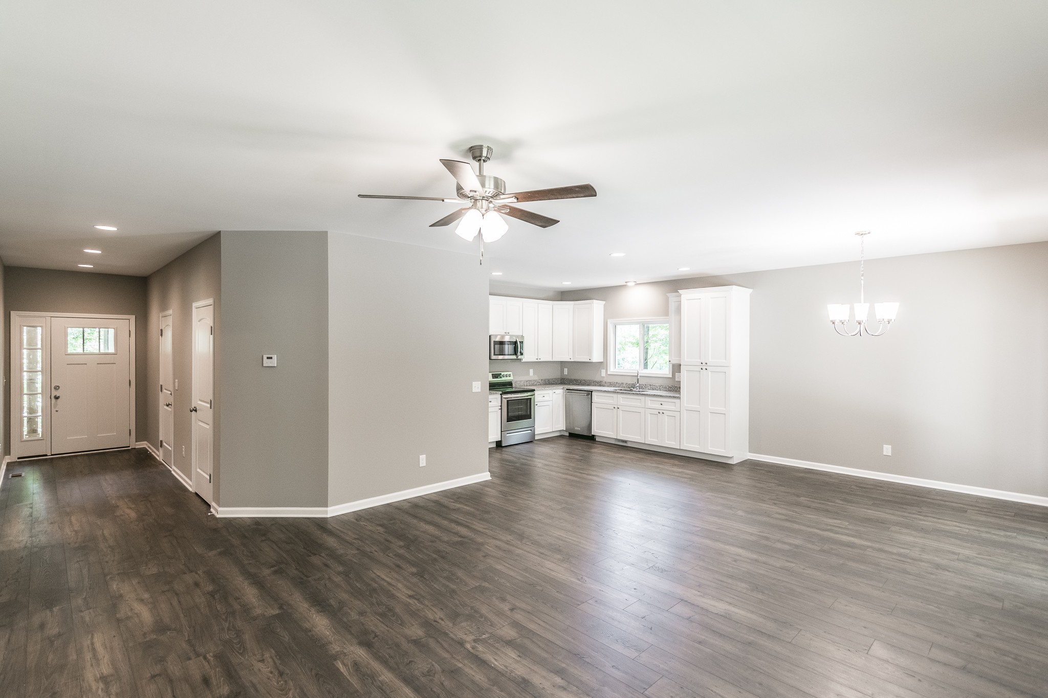 1566 Old Gallatin Road Portland, TN 37148 - Photo 21 of 49 a view of an empty room with window and wooden floor