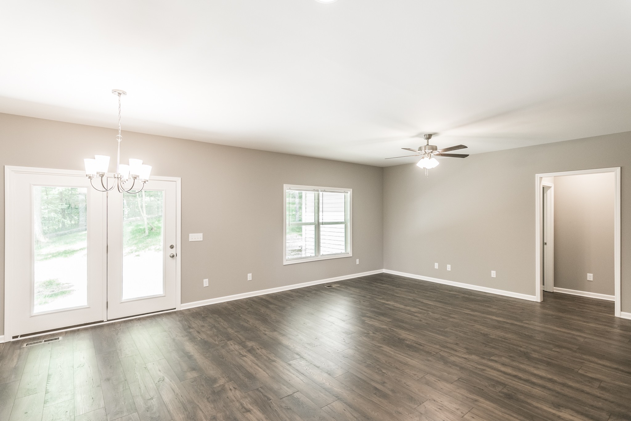 1566 Old Gallatin Road Portland, TN 37148 - Photo 24 of 49 a view of empty room with wooden floor and fan