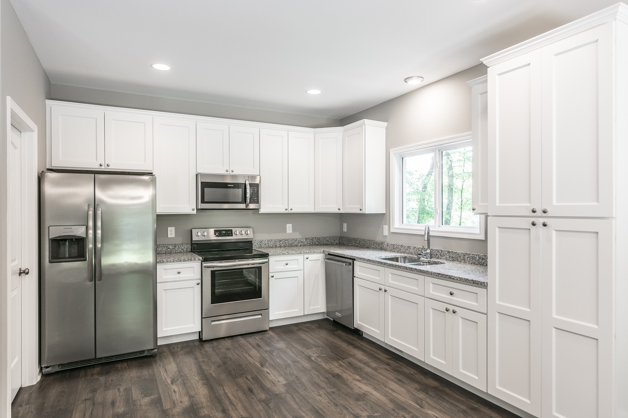 1566 Old Gallatin Road Portland, TN 37148 - Photo 27 of 49 a kitchen with a sink stainless steel appliances and window