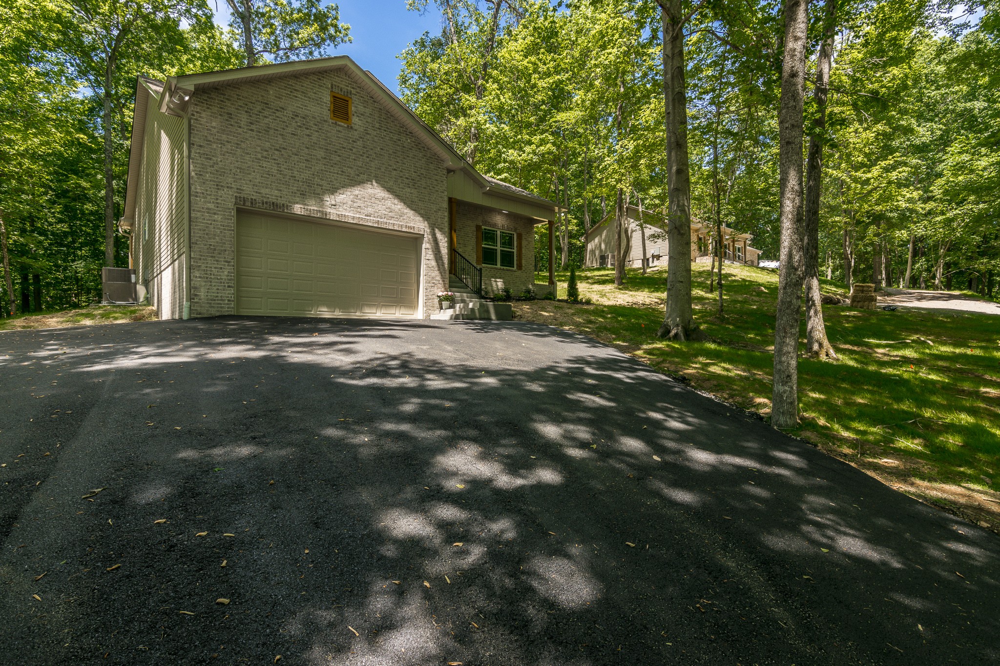 1566 Old Gallatin Road Portland, TN 37148 - Photo 4 of 49 a view of a house with backyard and trees