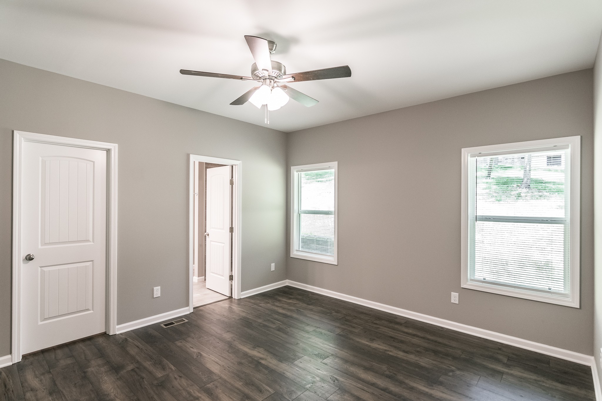 1566 Old Gallatin Road Portland, TN 37148 - Photo 33 of 49 a view of an empty room with wooden floor and a window