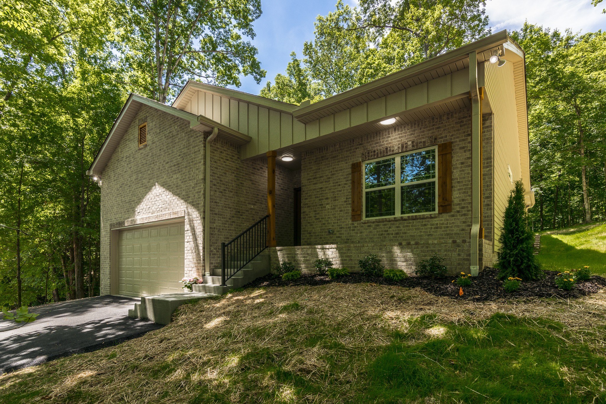 1566 Old Gallatin Road Portland, TN 37148 - Photo 5 of 49 a front view of a house with a yard