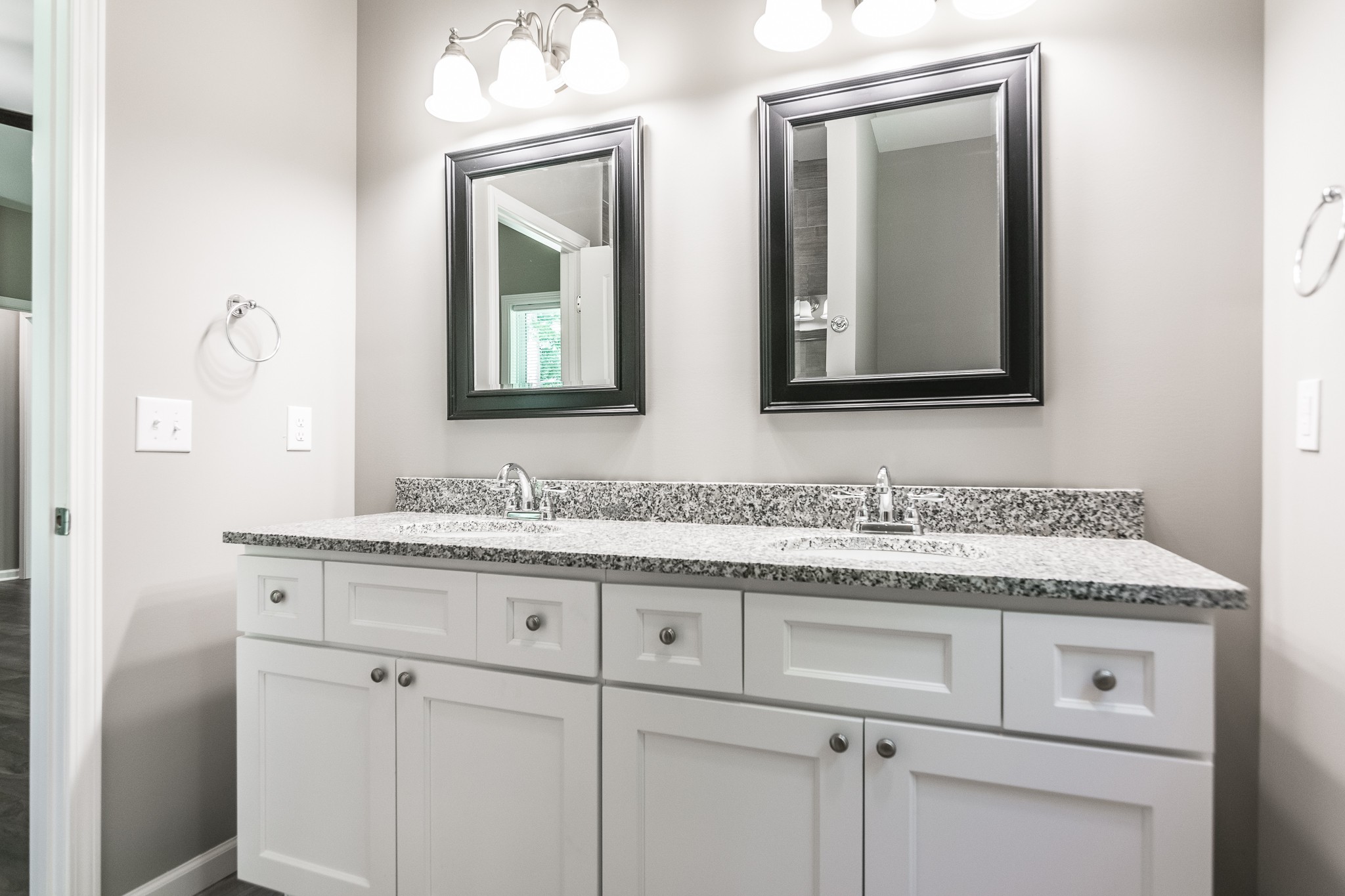 1566 Old Gallatin Road Portland, TN 37148 - Photo 41 of 49 a bathroom with a granite countertop double vanity sink and mirror