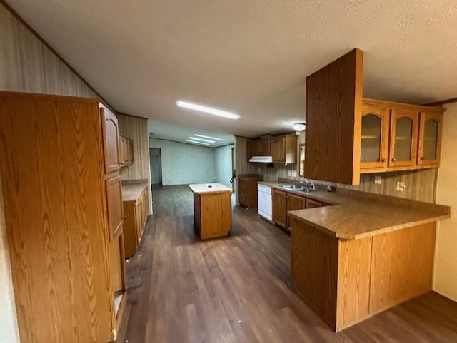 137 Lucas Pipeline Road Ruffs Dale, PA 15679 - Photo 5 of 35 a kitchen with stainless steel appliances granite countertop a refrigerator a stove top oven a sink dishwasher and wooden cabinets with wooden floor
