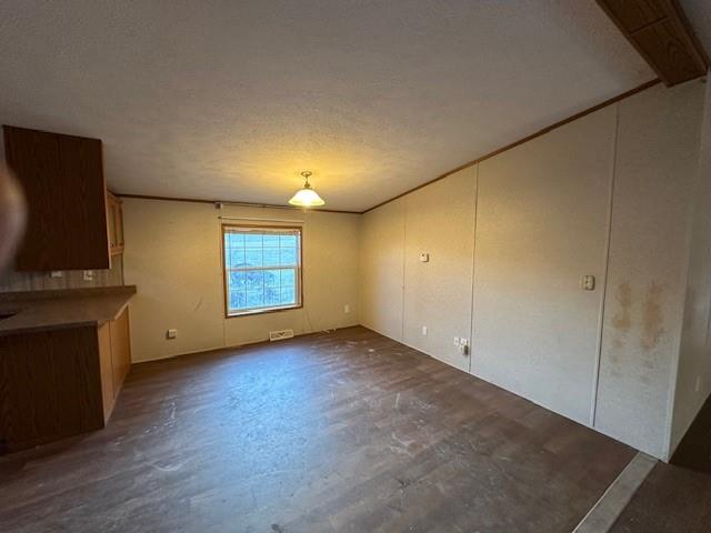 137 Lucas Pipeline Road Ruffs Dale, PA 15679 - Photo 6 of 35 a view of an empty room with wooden floor and a window
