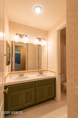 a room with wooden floor and closet