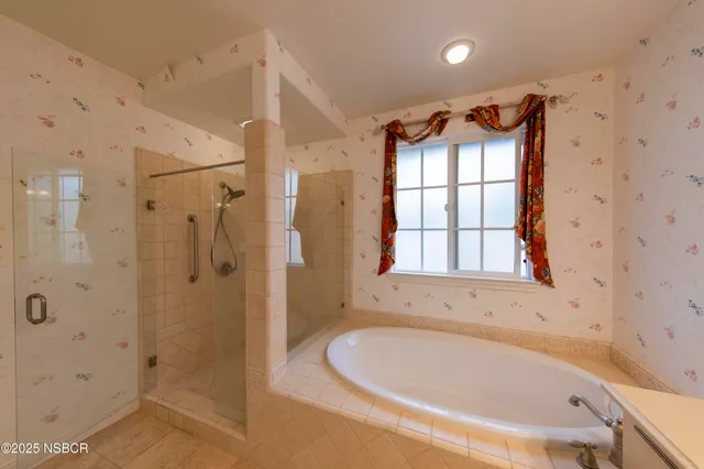 a view of storage and utility room with closet