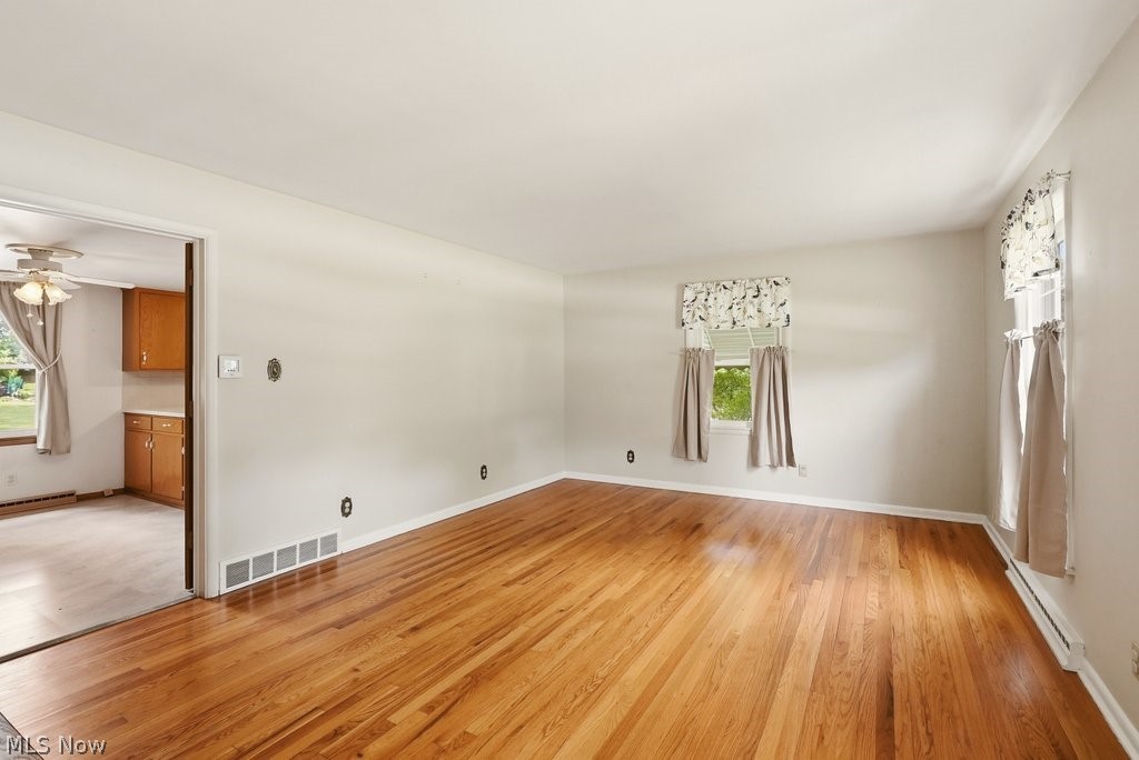 161 Pinehurst Road Munroe Falls, OH 44262 - Photo 5 of 40 Spacious living area featuring polished wood-finish flooring