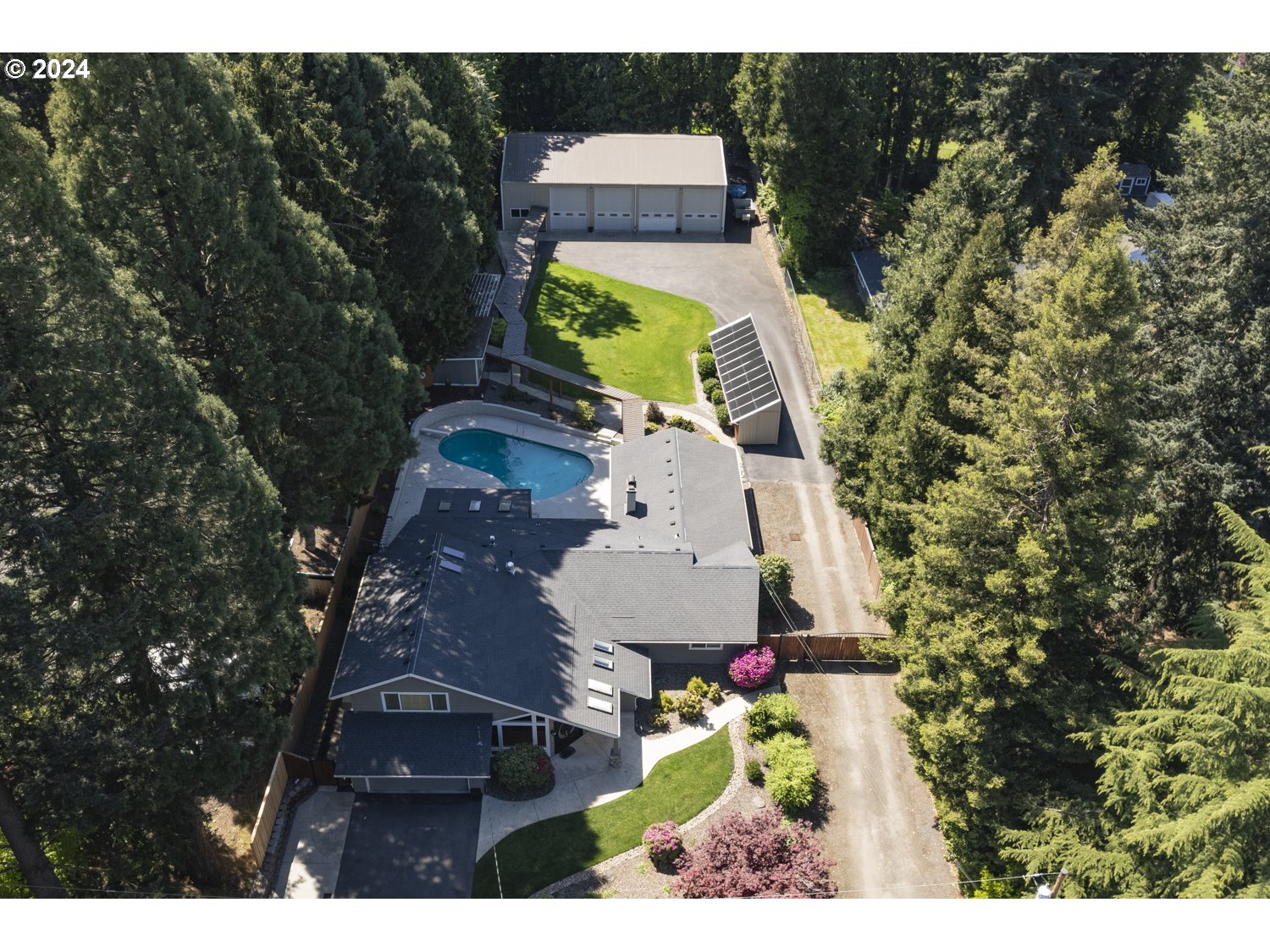 a view of a house with a swimming pool