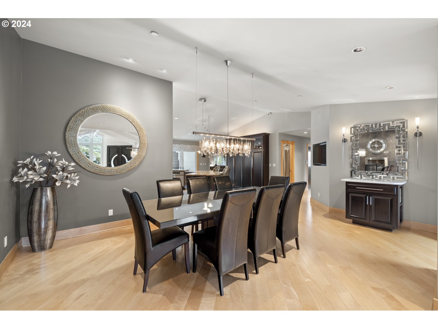 8857 Southwest Edgewood Street Tigard, OR 97223 - Photo 12 of 48 a view of a dining room with furniture and a chandelier