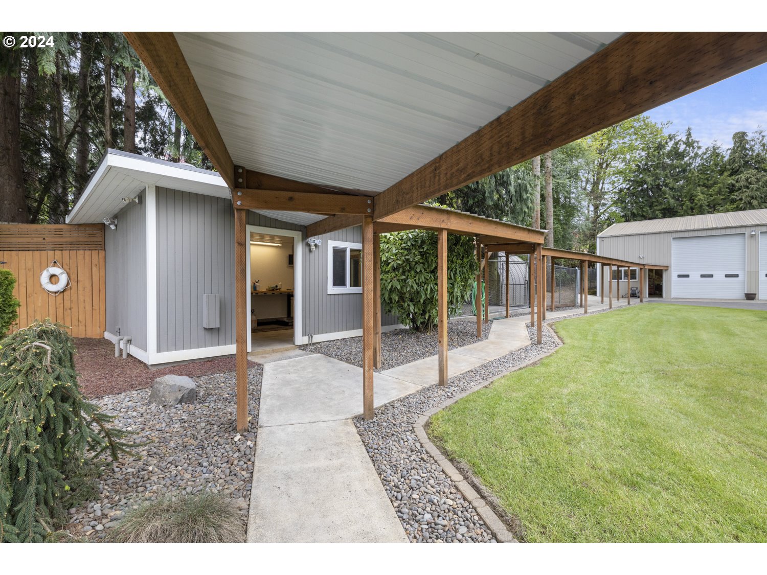8857 Southwest Edgewood Street Tigard, OR 97223 - Photo 37 of 48 a house view with a backyard space