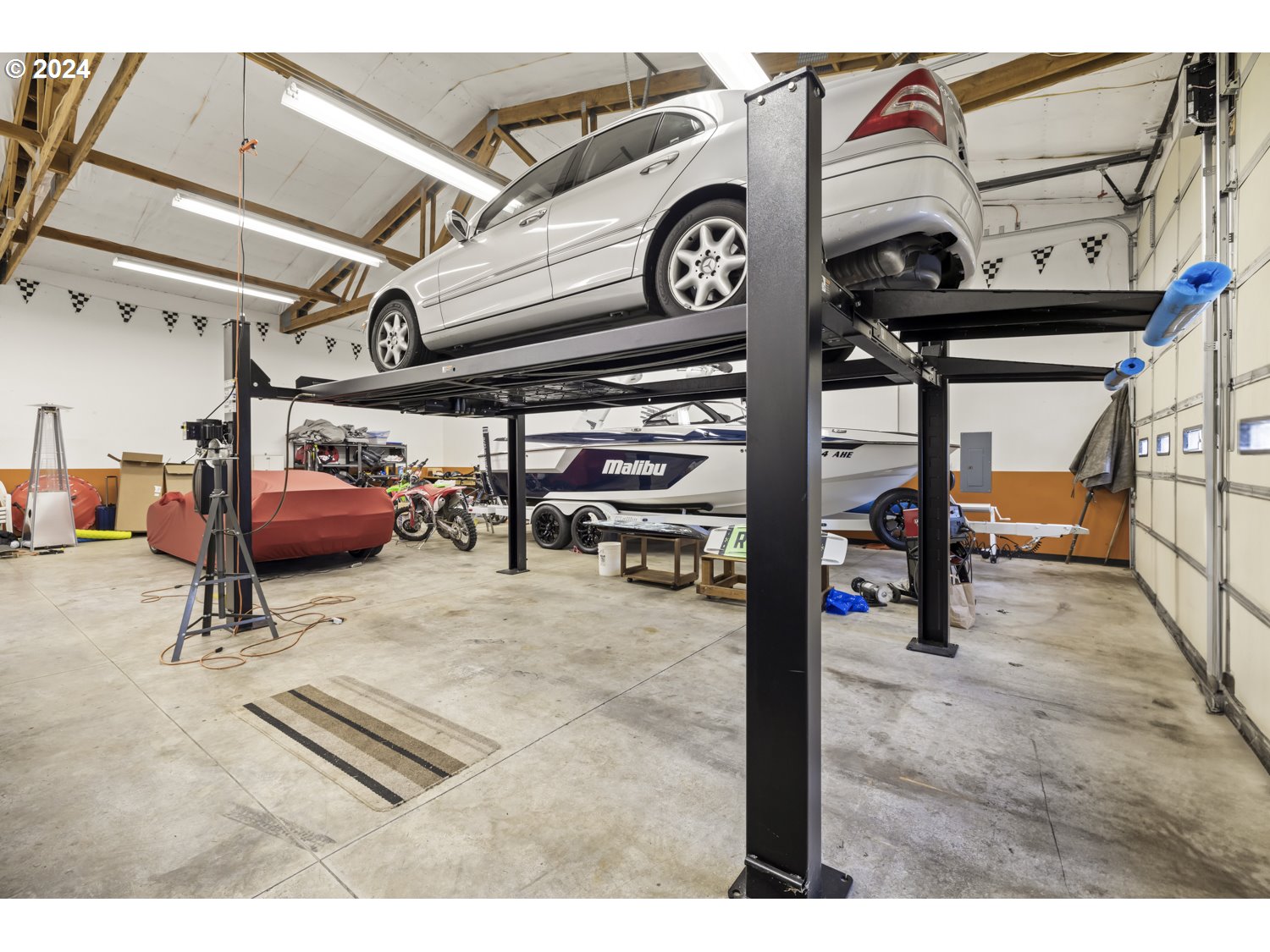 8857 Southwest Edgewood Street Tigard, OR 97223 - Photo 41 of 48 a view of a garage with storage