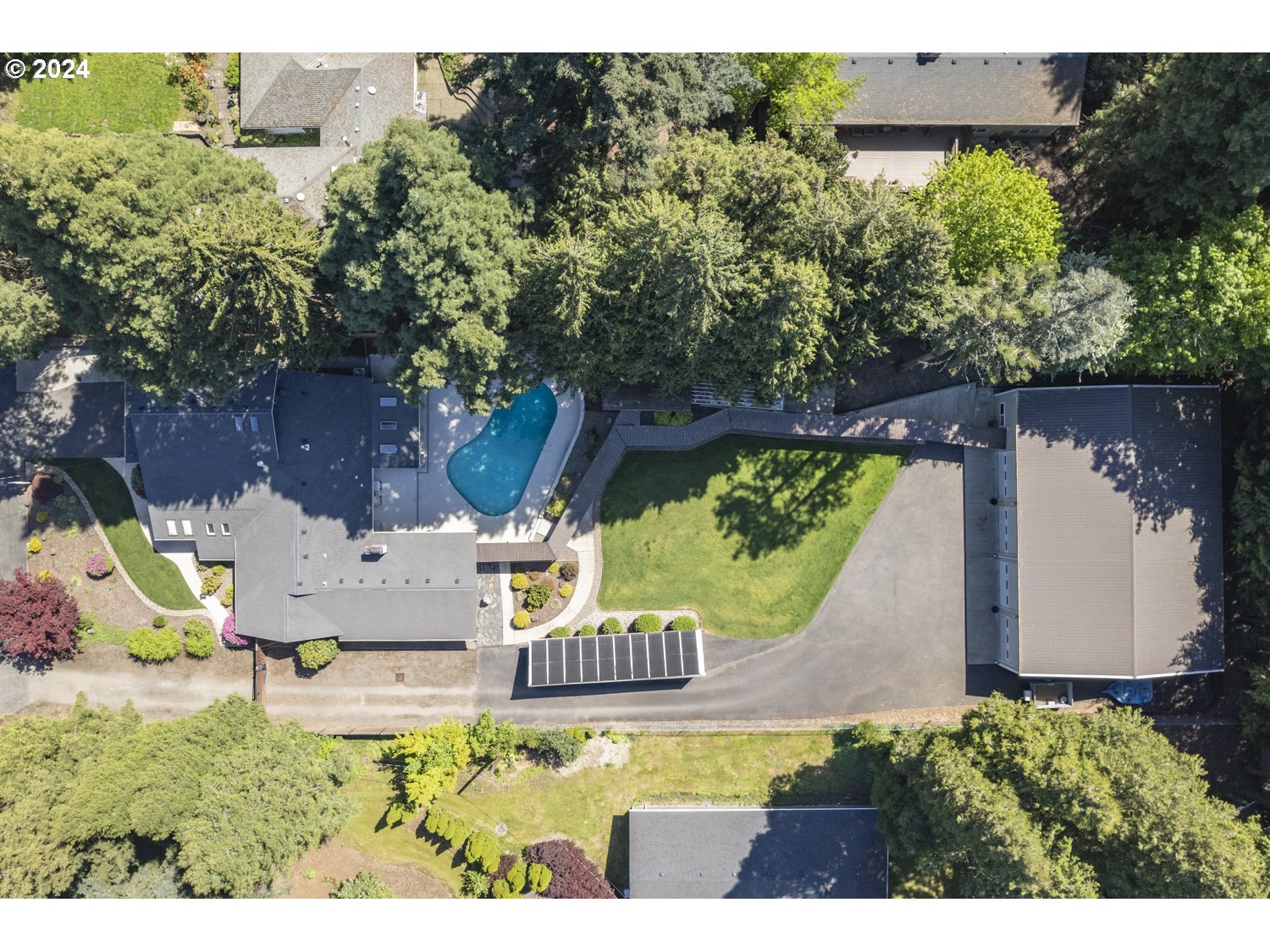8857 Southwest Edgewood Street Tigard, OR 97223 - Photo 44 of 48 an aerial view of a house with outdoor space