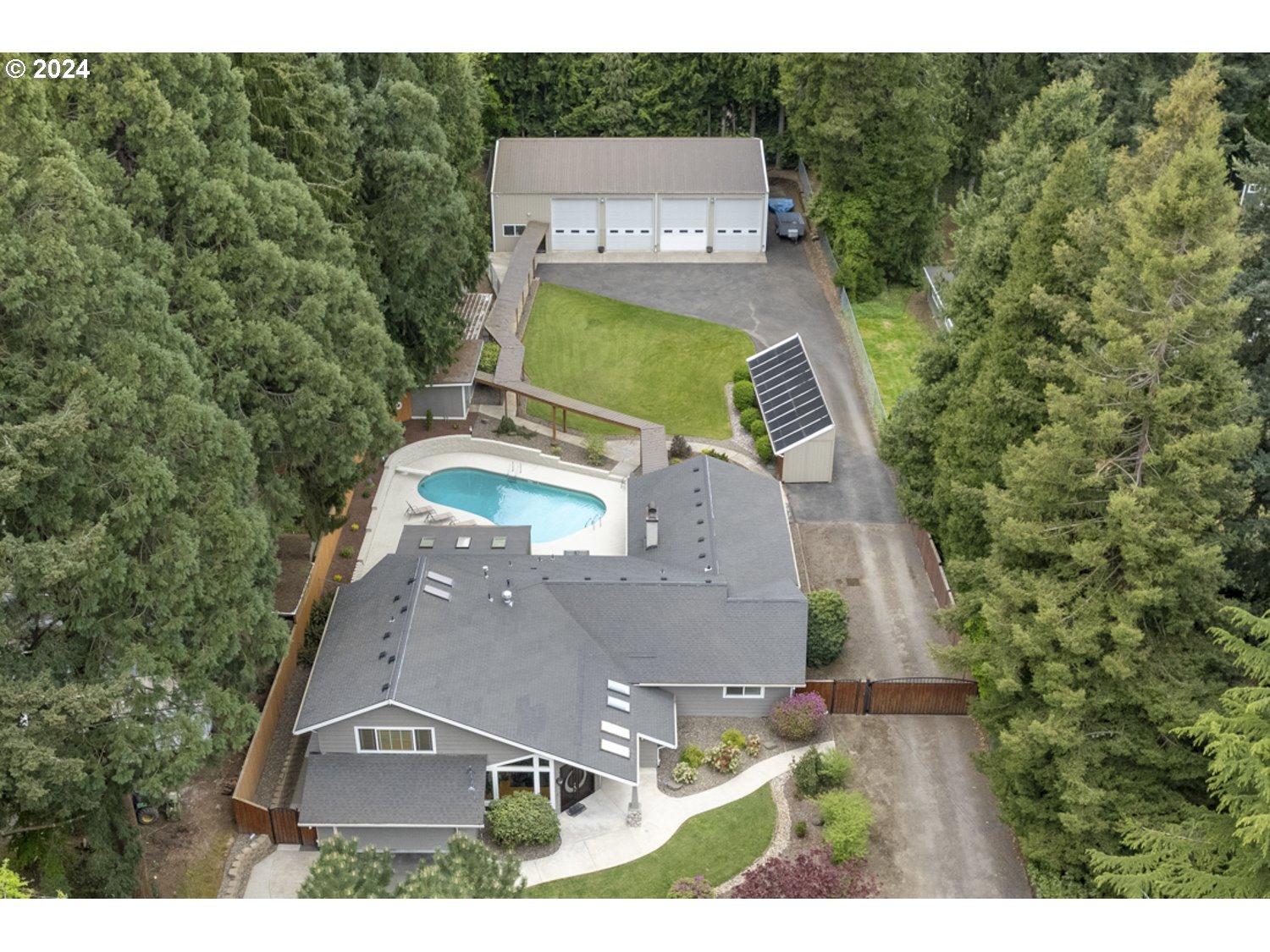 8857 Southwest Edgewood Street Tigard, OR 97223 - Photo 48 of 48 an aerial view of a house with outdoor space
