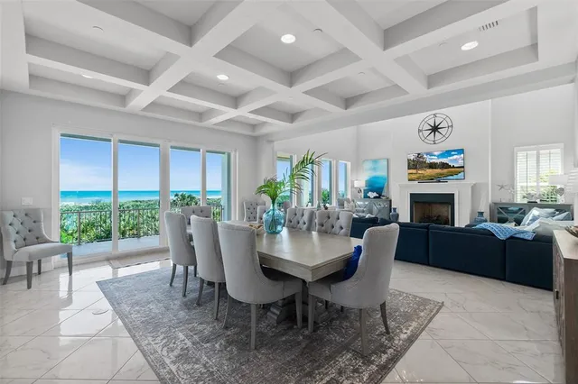 a view of living room with granite countertop furniture and fireplace