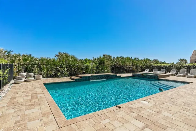 a view of a building with a yard