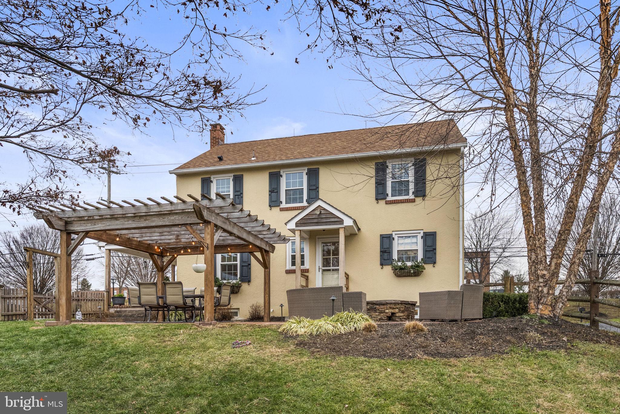 1776 West Doe Run Road Kennett Square, PA 19348 - Photo 2 of 34 front view of a house with a yard