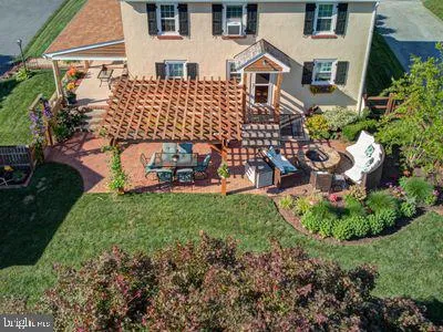 front view of a house with a garden