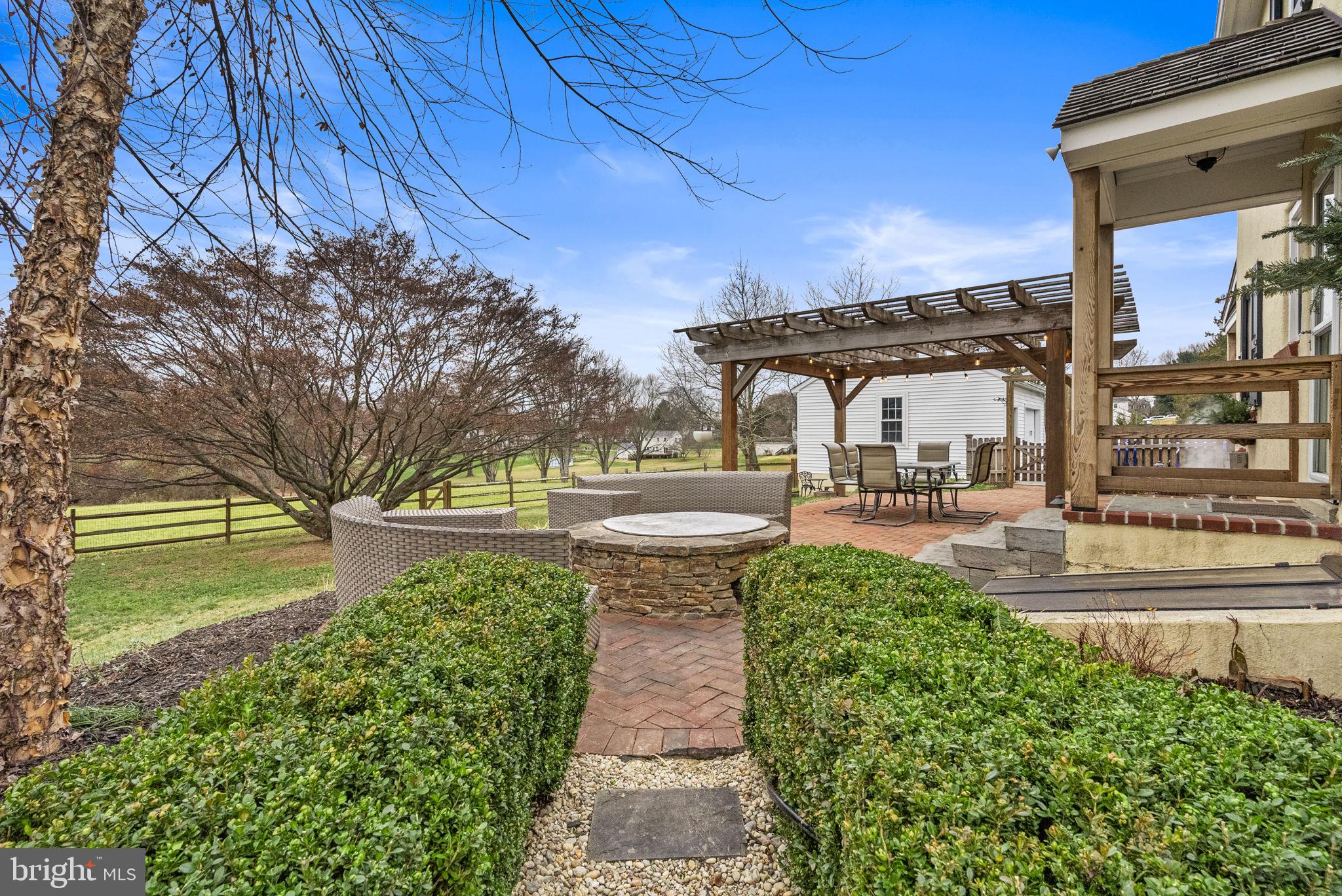 1776 West Doe Run Road Kennett Square, PA 19348 - Photo 5 of 34 a view of a yard with plants and large trees