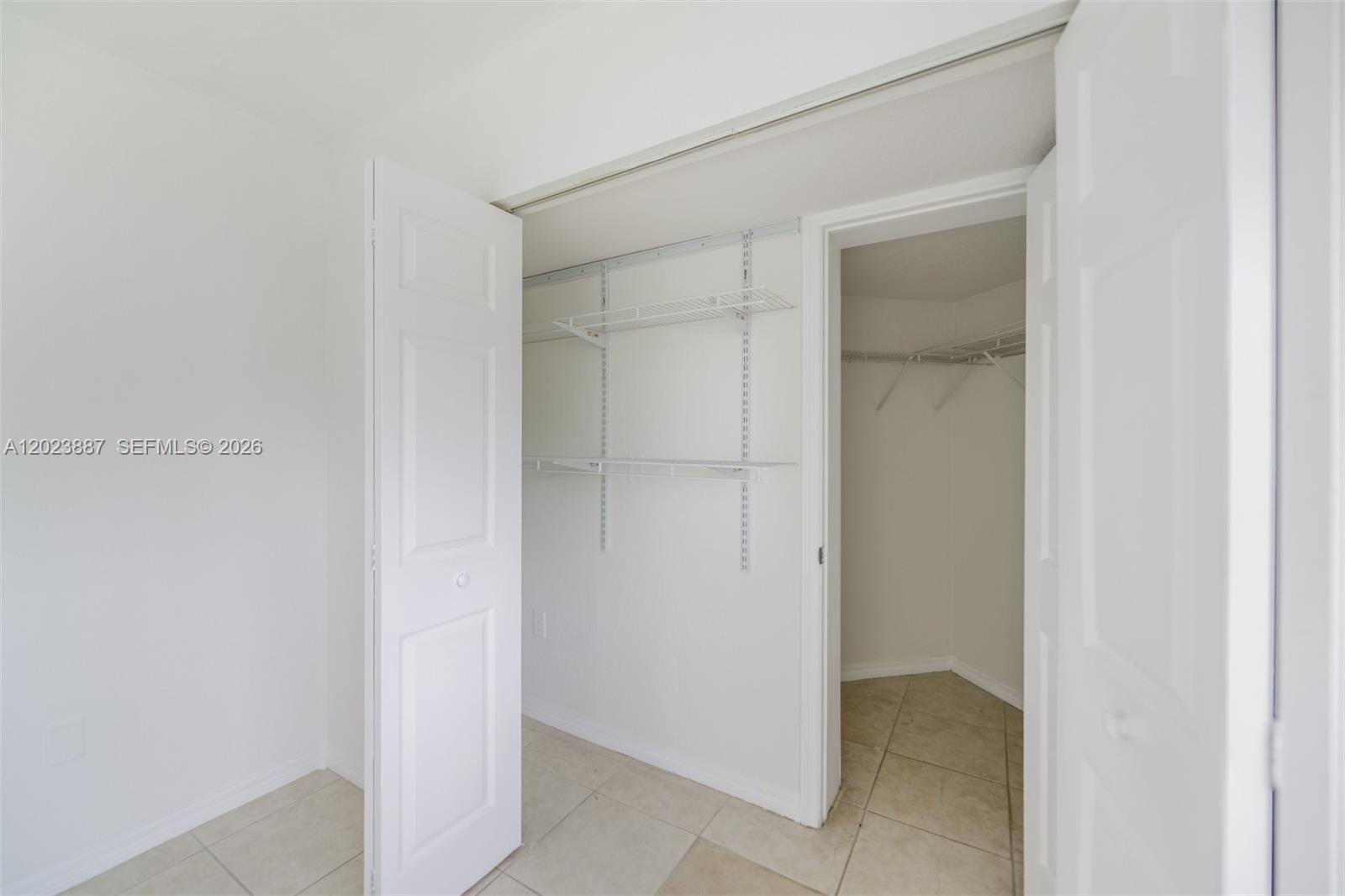 7737 Southwest 88th Street, Unit C312 Miami, FL 33156 - Photo 17 of 32 a view of an empty room