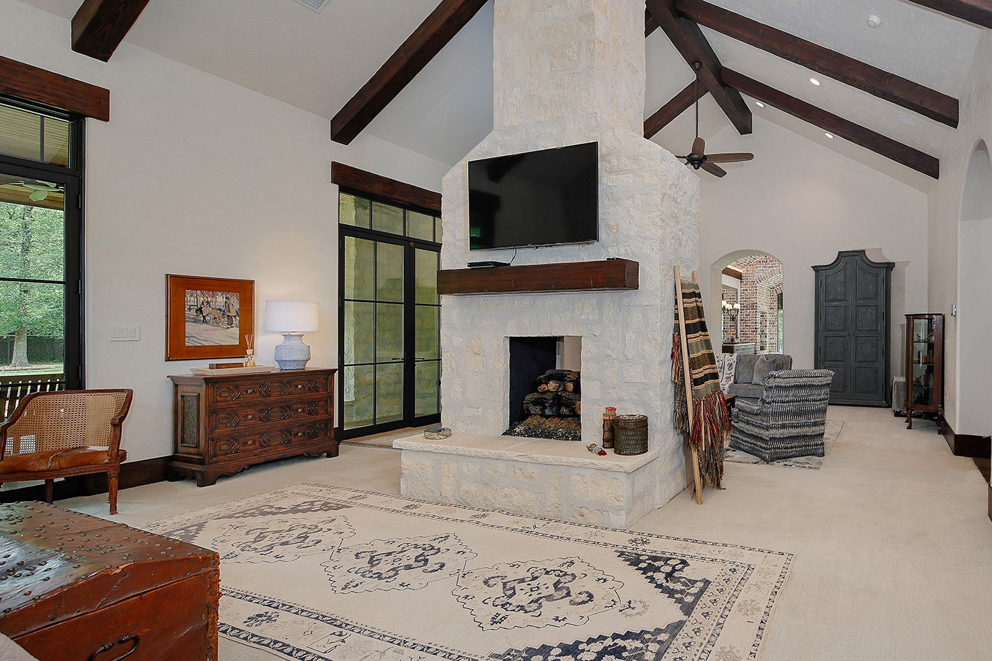 40693 Center Hill Road Hempstead, TX 77445 - Photo 13 of 50 The fireplace cleverly divides the sleeping area from the sitting area.