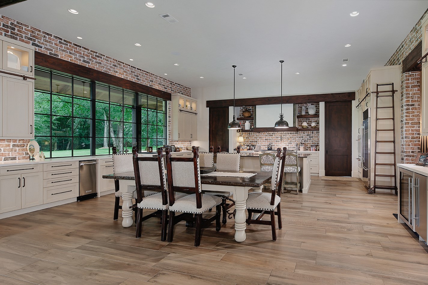40693 Center Hill Road Hempstead, TX 77445 - Photo 23 of 50 More casual dining in this open concept breakfast room and kitchen with additional seating at the bar.