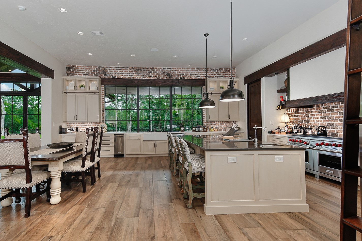 40693 Center Hill Road Hempstead, TX 77445 - Photo 24 of 50 Designed and built by Bentwood of Houston this outstanding kitchen is a chefs dream! Only the best appliances including a 60 inch Wolf oven, Sub Zero refrigerator, Asko dishwasher and Scotsman Ice maker.