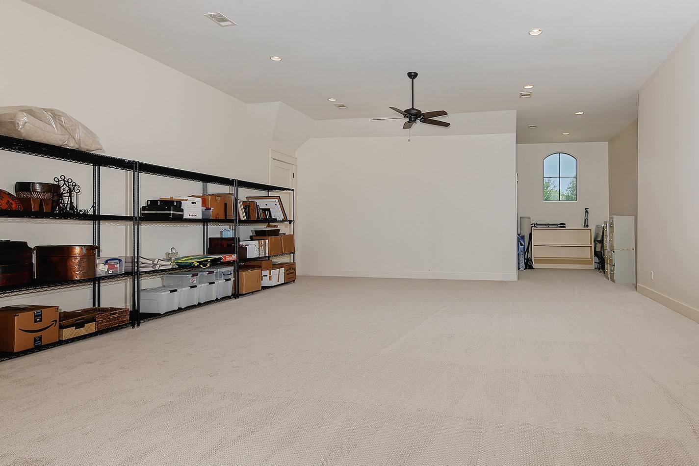 40693 Center Hill Road Hempstead, TX 77445 - Photo 33 of 50 A stunning stone and tile accent staircase takes you upstairs to this huge bonus room. The whole house electronics and breaker boxes are housed in a room off to the left. In addition there are two more large secondary bedrooms upstairs with private ensuite bathrooms.