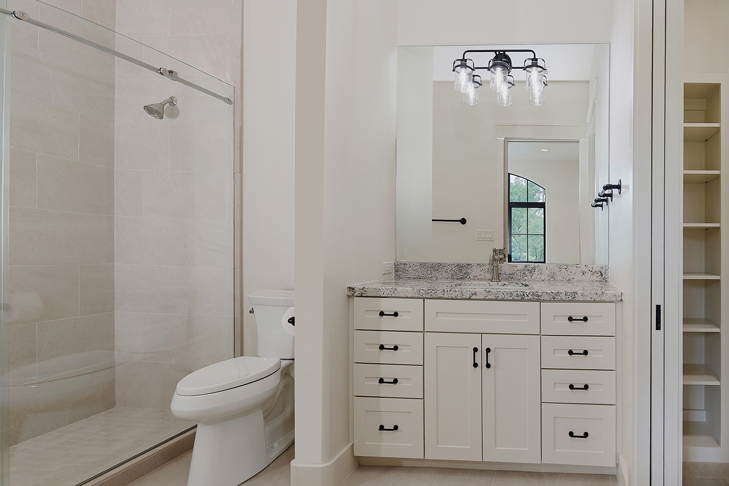 40693 Center Hill Road Hempstead, TX 77445 - Photo 34 of 50 One of the two full bathrooms upstairs with large showers and stone vanities.