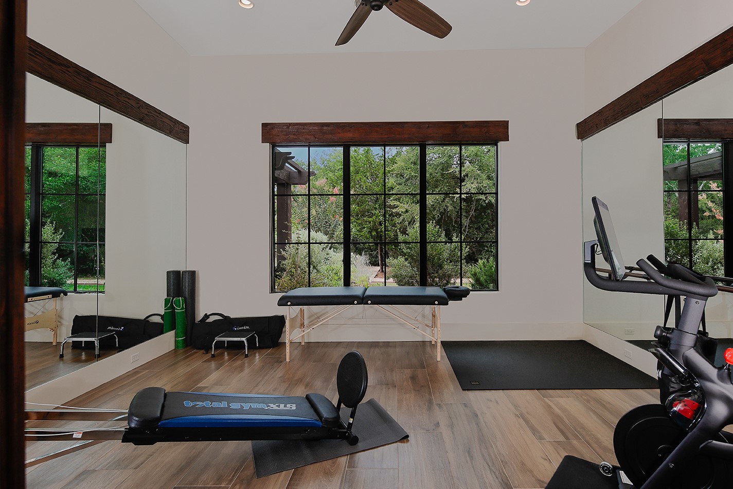 40693 Center Hill Road Hempstead, TX 77445 - Photo 10 of 50 The exercise room located next to the primary suite also provides attic access via remote-controlled drop-down stairs.