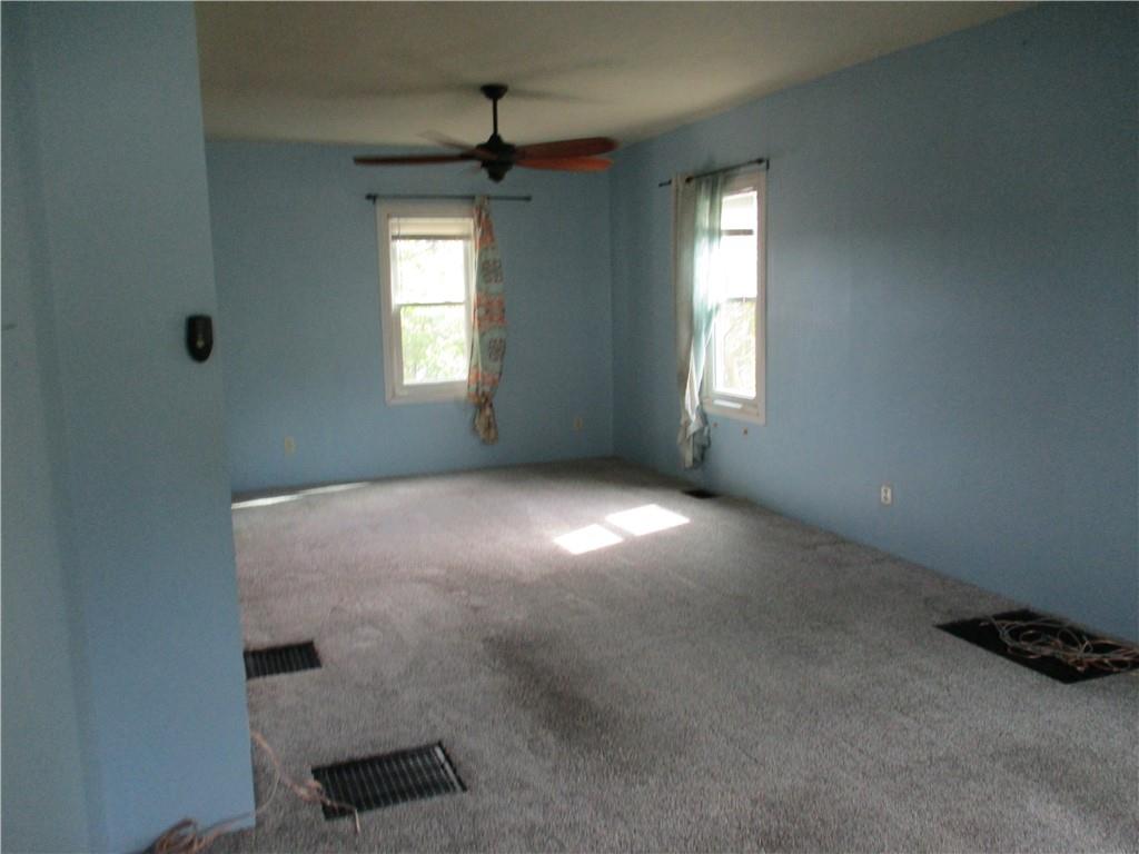 320 Main Street Lyndora, PA 16045 - Photo 4 of 11 a view of an empty room with a window