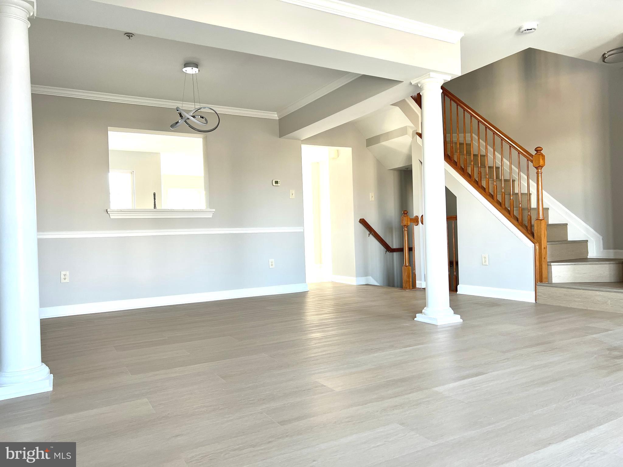 2026 Weitzel Court Frederick, MD 21702 - Photo 15 of 30 a view of an entryway with wooden floor