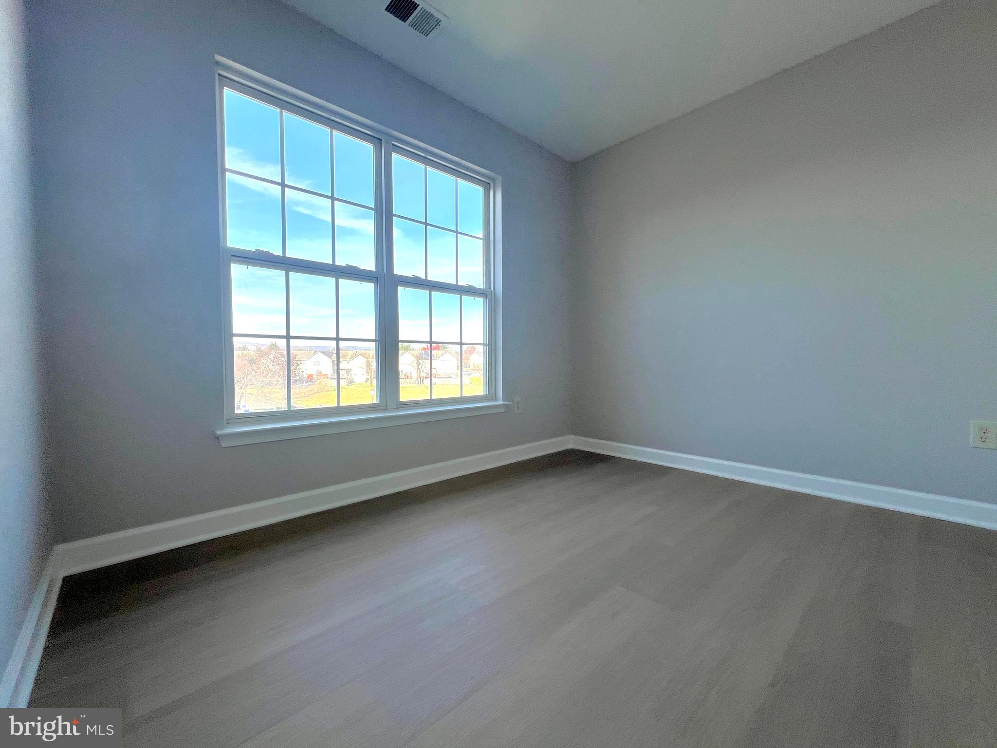 2026 Weitzel Court Frederick, MD 21702 - Photo 27 of 30 an empty room with a window
