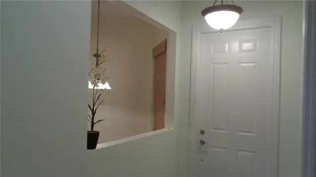 a view of a hallway with entryway