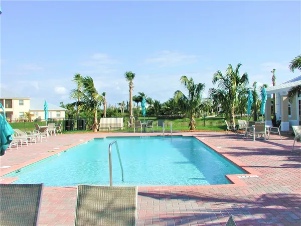 a view of a swimming pool and an outdoor space
