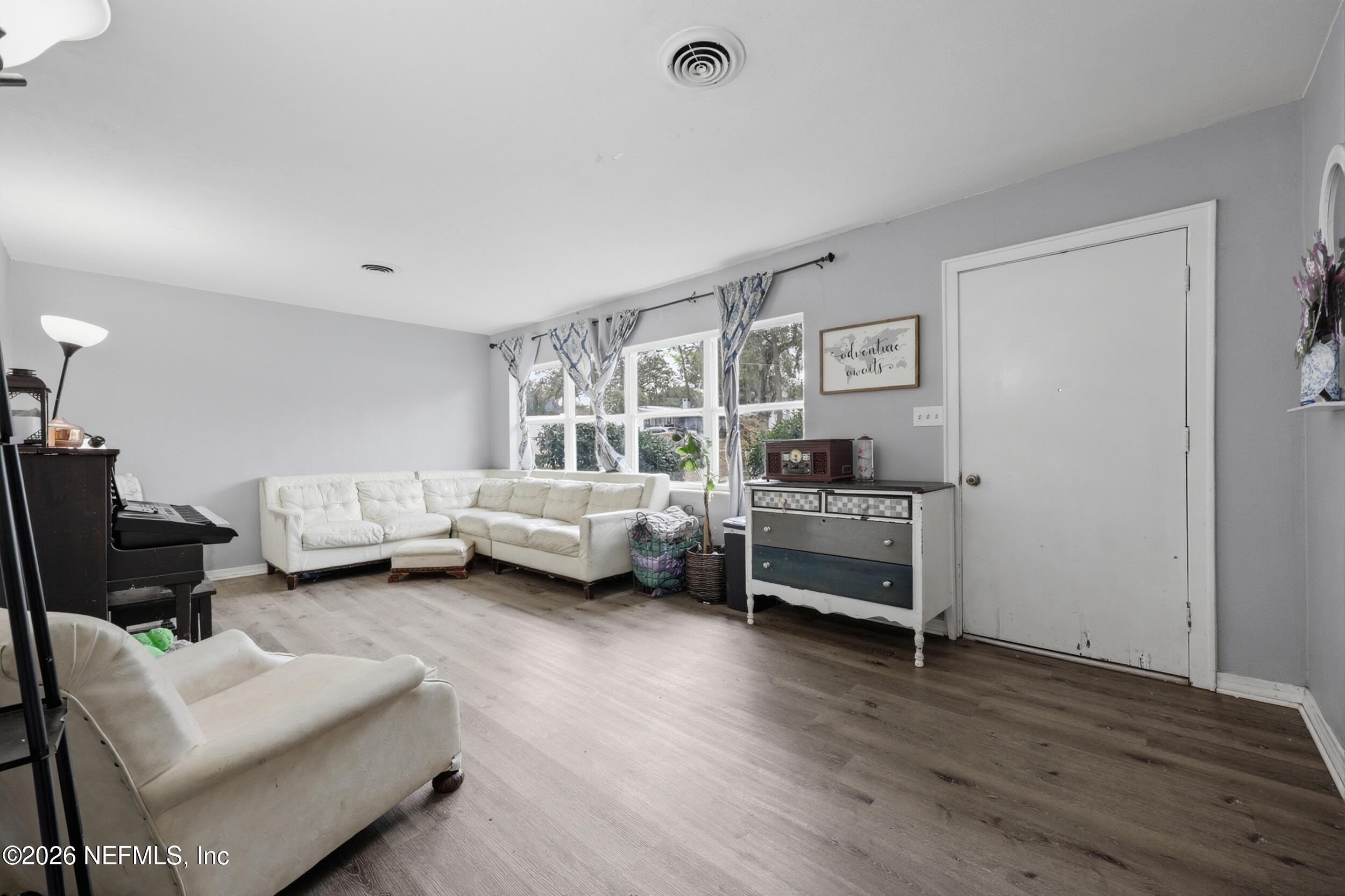 101 Cedar Street Palatka, FL 32177 - Photo 12 of 43 a bedroom with furniture and a window