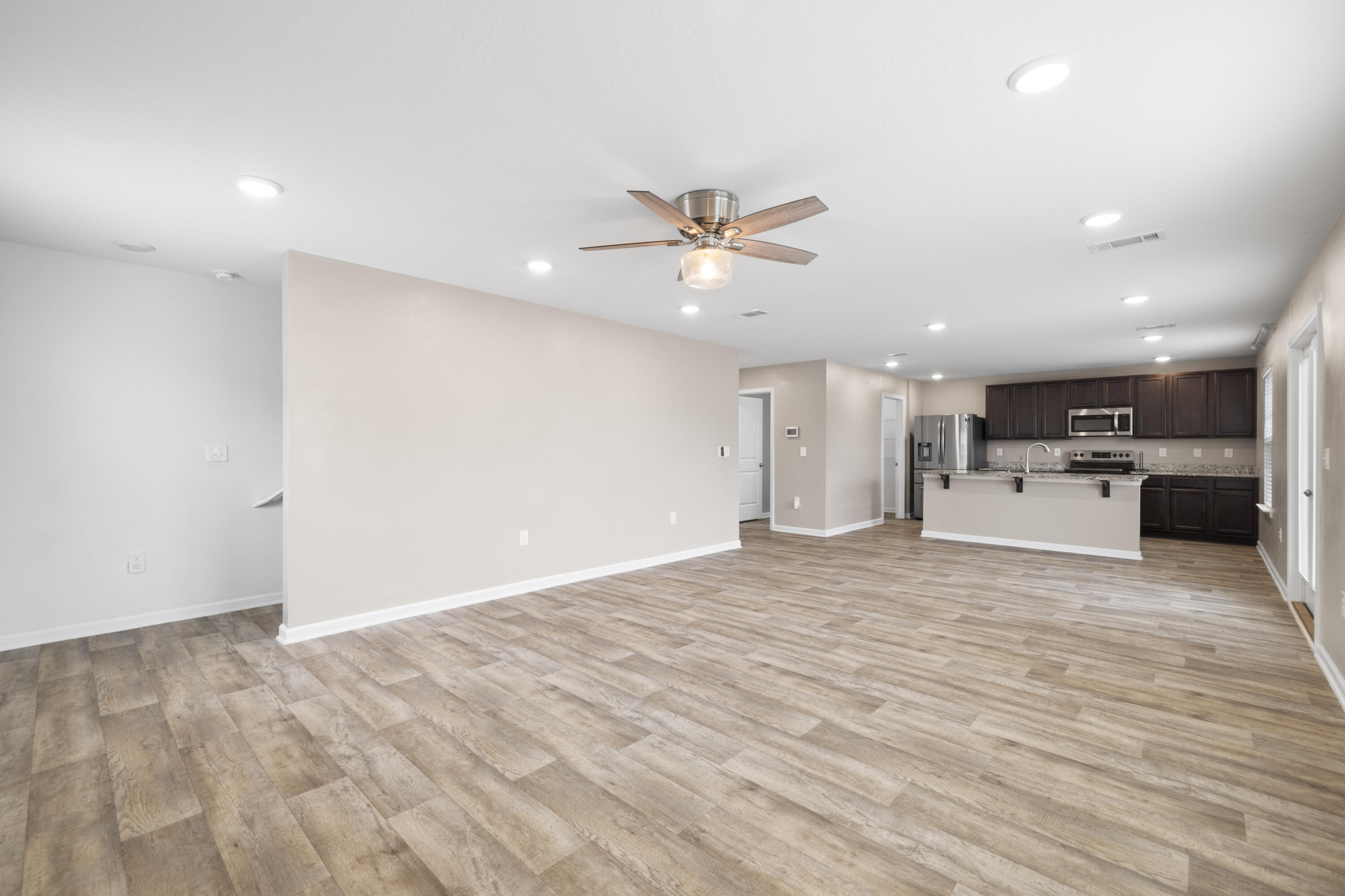 814 Moorhen Way Crestview, FL 32539 - Photo 13 of 29 a view of kitchen and a hallway with a kitchen