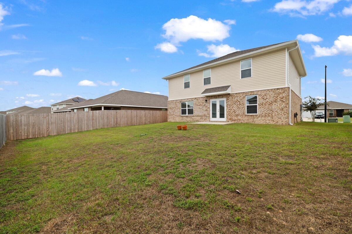814 Moorhen Way Crestview, FL 32539 - Photo 2 of 29 a view of a house with a yard