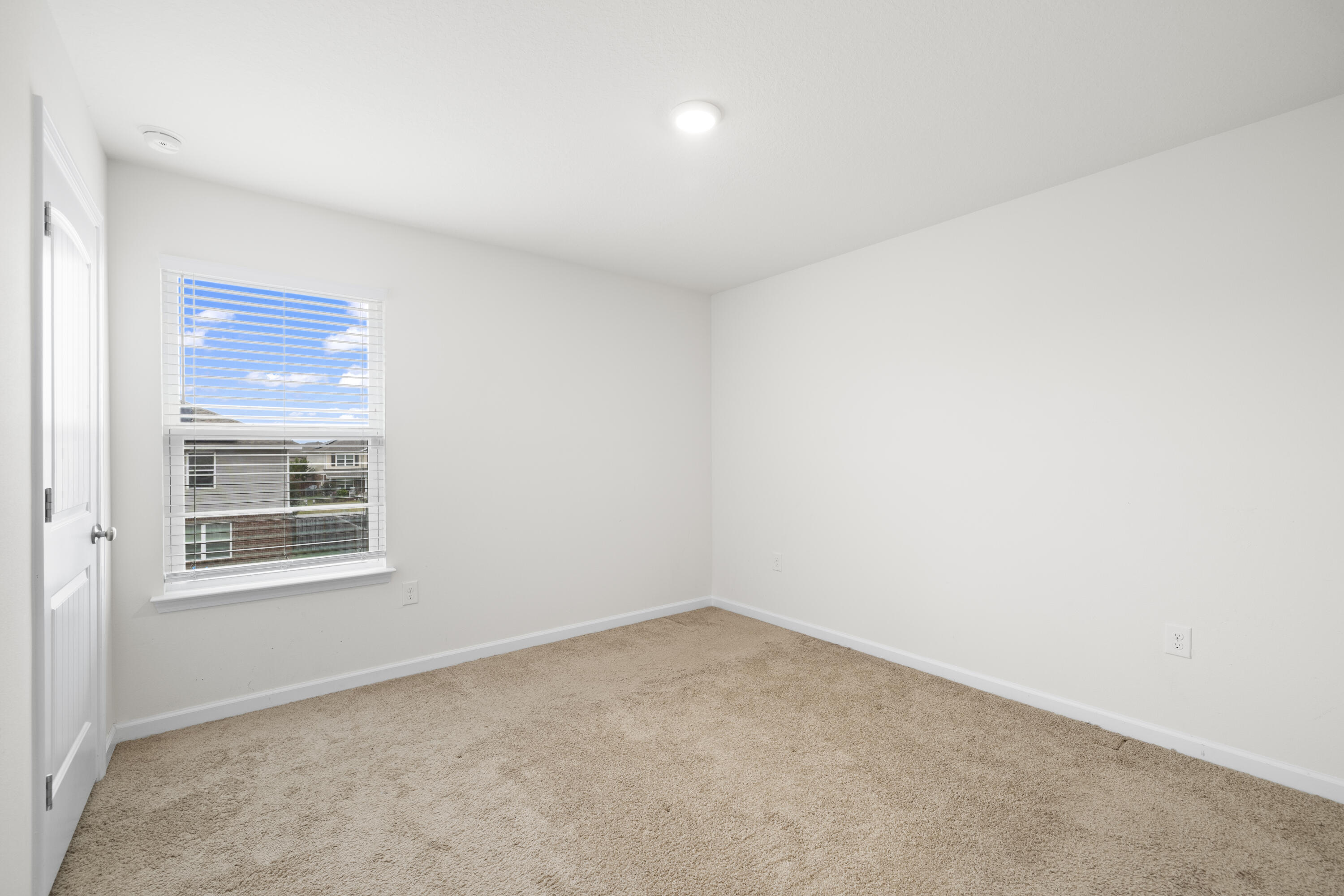 814 Moorhen Way Crestview, FL 32539 - Photo 7 of 29 an empty room with a window