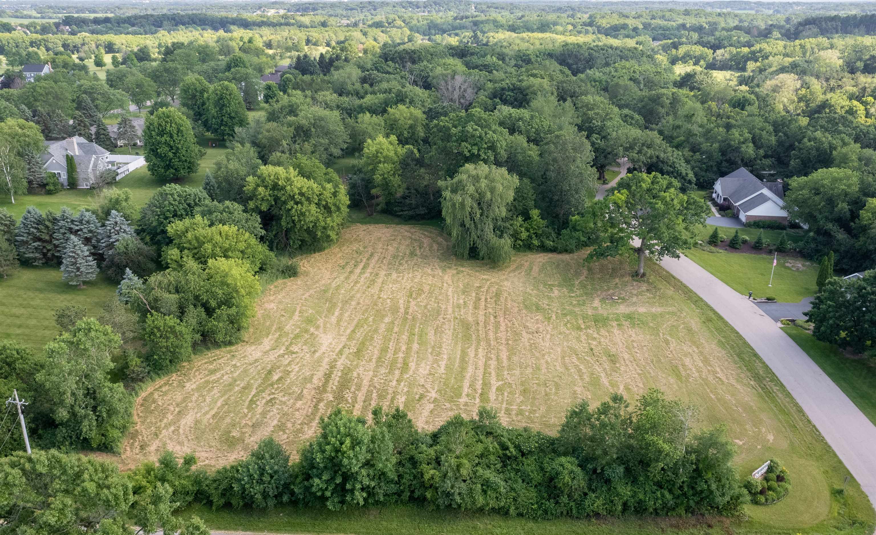 11999 Oakridge Road Caledonia, IL 61011 - Photo 14 of 17 an aerial view of a house with a yard