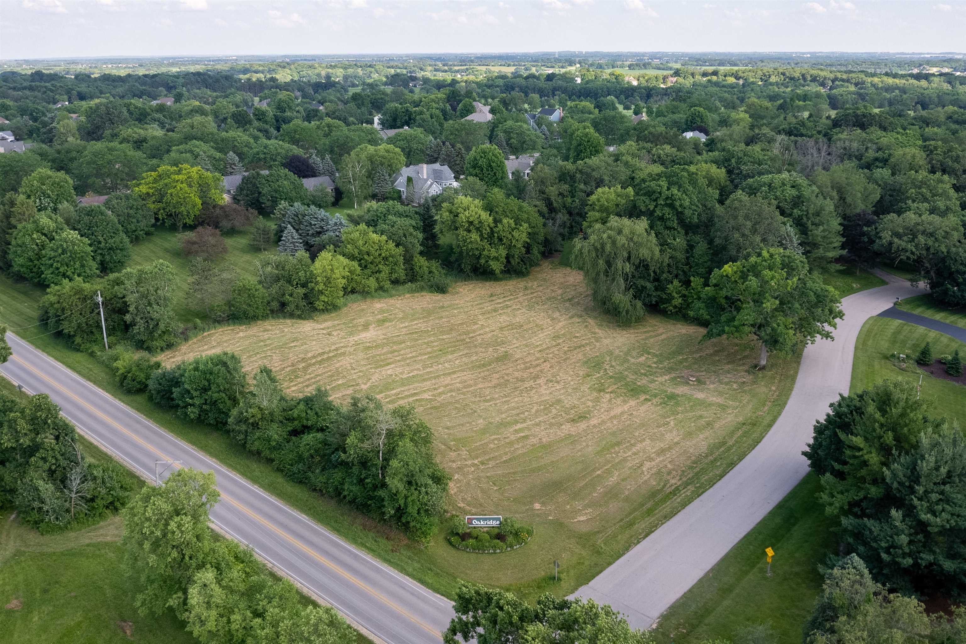 11999 Oakridge Road Caledonia, IL 61011 - Photo 15 of 17 a view of a yard with potted plants