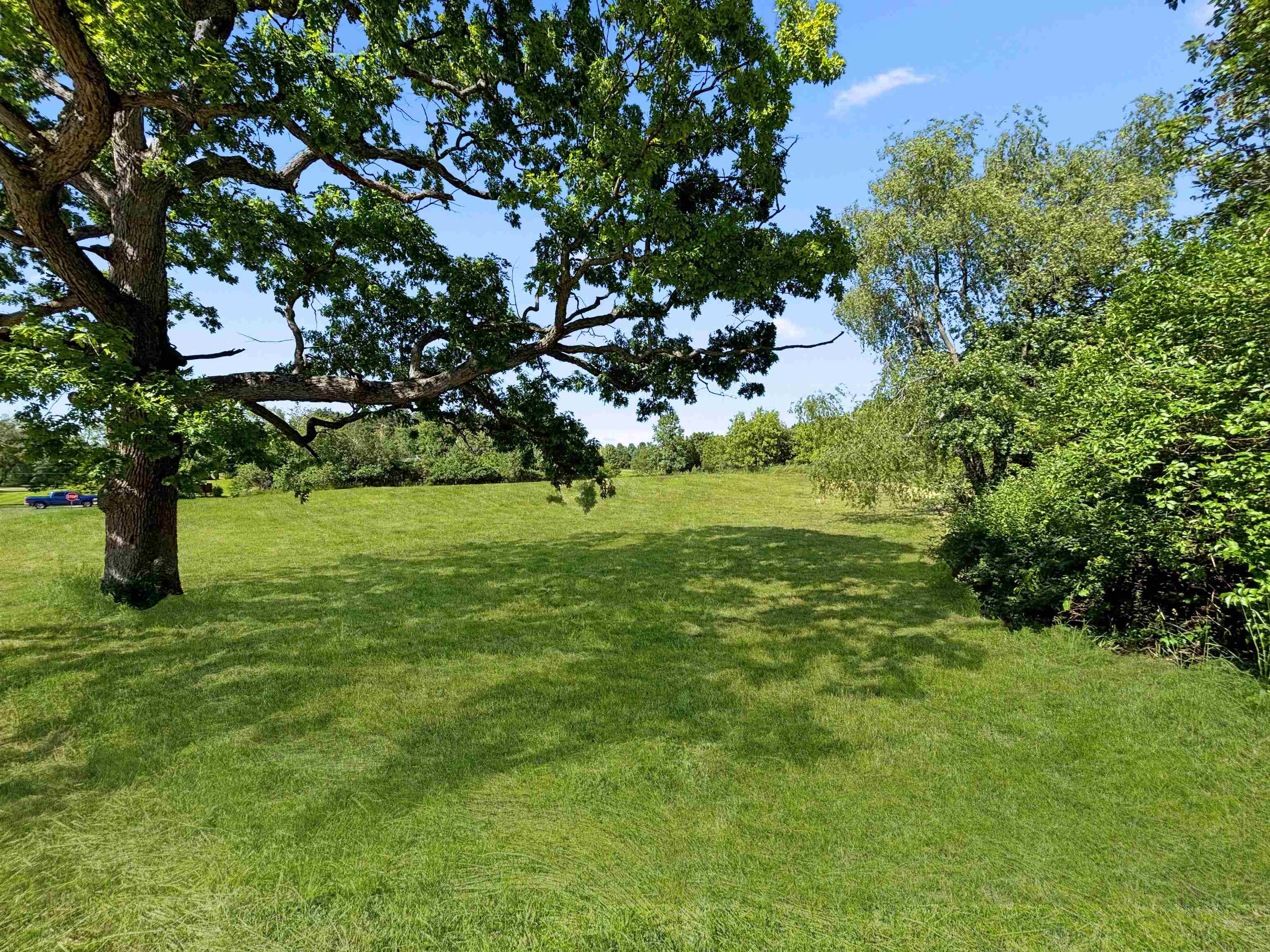 11999 Oakridge Road Caledonia, IL 61011 - Photo 3 of 17 a view of a trees with a big yard