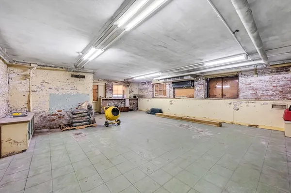 a view of garage with furniture