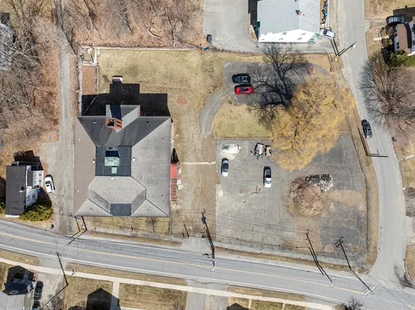 an aerial view of houses with outdoor space