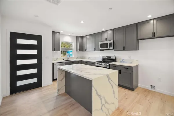 a view of kitchen and utility room