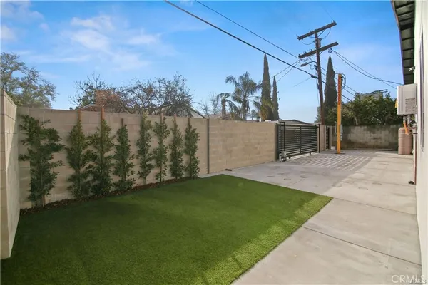 a kitchen with a sink cabinets and stainless steel appliances