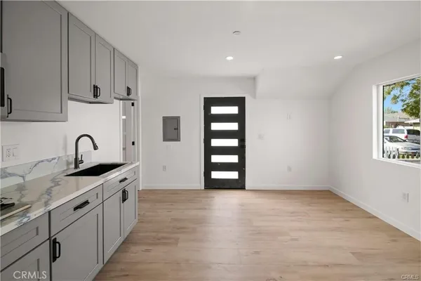 a bathroom with a sink and mirror
