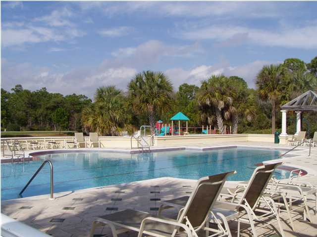 4595 Sailmaker Lane Destin, FL 32541 - Photo 11 of 14 a view of a swimming pool with a lounge chair